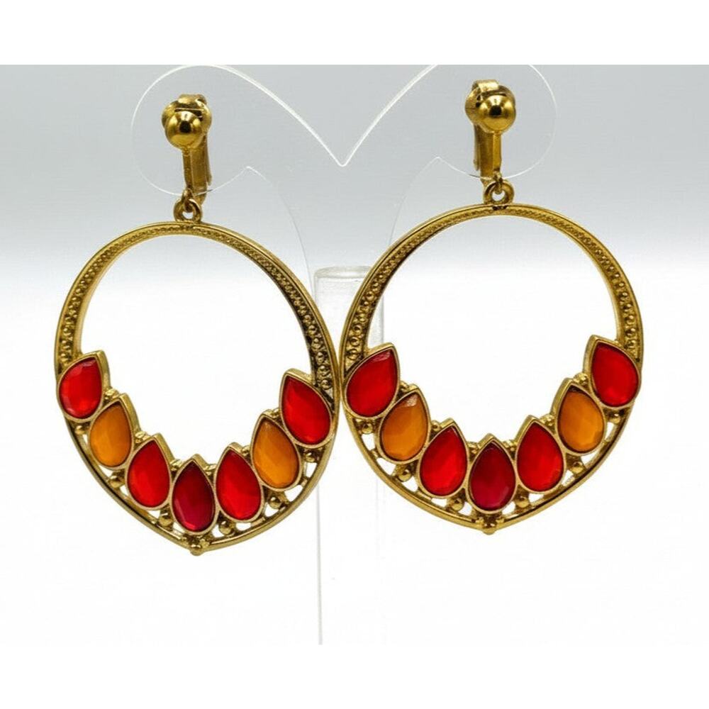 Clip on 2 1/2" gold hoop earrings with yellow and orange stones
